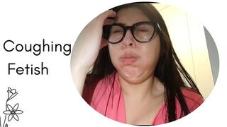 Coughing and massaging my throat