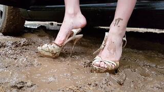 High heels sandals in deep mud and puddles, wrecked high heels sandals, high heels wet, muddy feet, feet in mud, ruined sandals, stilettos in mud