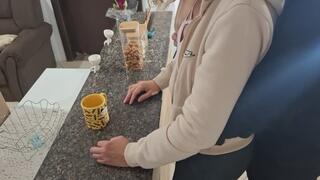 A stepdaughter is surprised while having breakfast