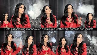 Goth girl smoking marlboro red 100s in red leather bra, harness and jacket!