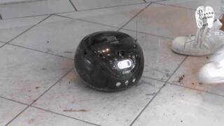 Radio crushed under Adidas Sneakers