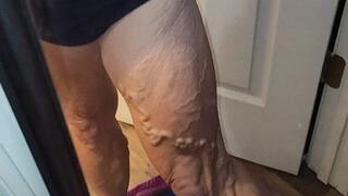 Tempest shows off swimsuit in mirror