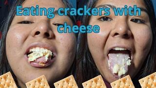 Eating crackers with cheese