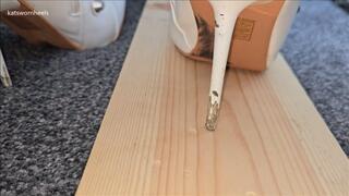 Sinking my Sharp Nail Heels White Stiletto Boots into Wood