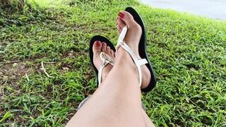 Roxan wears beautiful white flip-flops on her feet matching the pronounced arches (3)