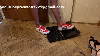 Nastya walks on her cuckold boyfriend's laptop, it crunches under her feet, she is in heels, barefoot, and in sneakers, she tramples the laptop, jumps on it, wipes dirty shoes and spits on the keyboard, on the screen, and she also sits her juicy ass