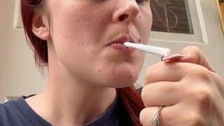 British Chav smokes a roll up