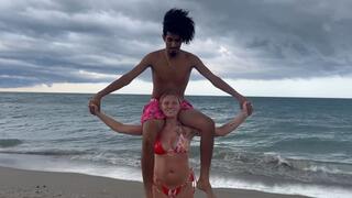 Cay Baby Lifts And Carries Jose At The Beach