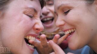 Emma and Hannah Bite Sadie