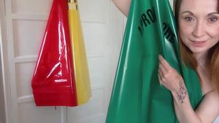 PVC Slut Shows Off Her PVC Aprons Spreads Her Pussy and Squirts on Them