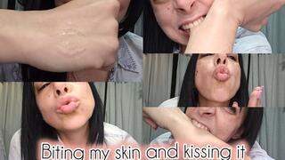 Biting my skin and kissing it