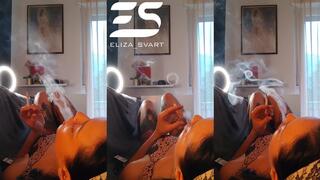 Chainsmoking two Marlboro reds and some smoke ring practice