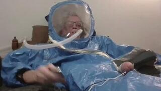 Enjoying being intubated on a ventilator session in a Hazmat Suit