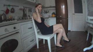 TOE TAPPING AND TALKING ON THE PHONE