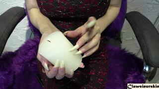 Nails Scratching a candle