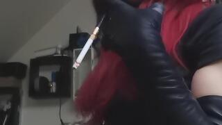 Smoking in nice leather dress