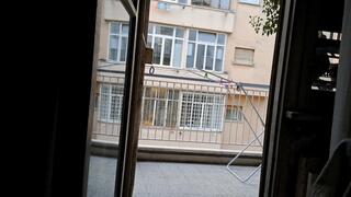 HANGING WASHING EXPOSING ASS AND TANNED LEGS