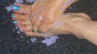 Melove sexy small feet with blue metallic nail polish getting waxed