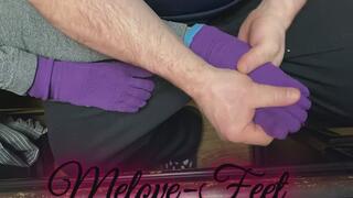 Melove getting her feet massaged in purple socks by Naelor