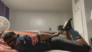 Football player in a hogtie