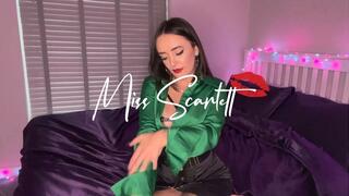 Scarlett's black pencil skirt and emerald satin blouse tease