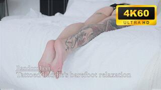 Tattoed baddie's barefoot relaxation
