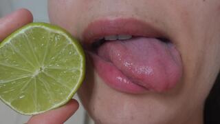 I bite into a lemon and make silly faces then I grimace and a lot of saliva flows from my mouth I put the lemon on my tongue and grimace in 4k