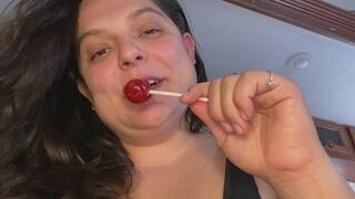 Sucking on sucker - Red Tongue