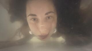 Nastya tests a case for underwater shooting (wet flowing hair)