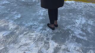 A girl in ballet flats slides on ice, falls and sometimes loses her ballet flats (short version)