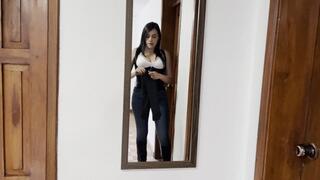 Kahina smokes sensually in jeans