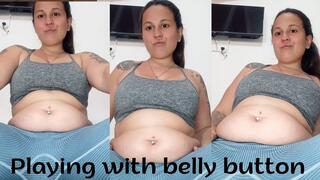 Playing belly button