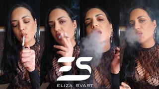 Smoking a Marlboro red in a bodystocking and bra