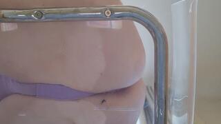 Unaware Giantess ass crushes tiny on perspex chair