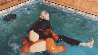 Alla jumps on a rare inflatable reindeer into a pool and it bursts