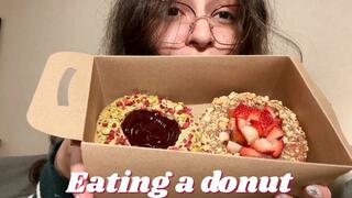 Eating a donut