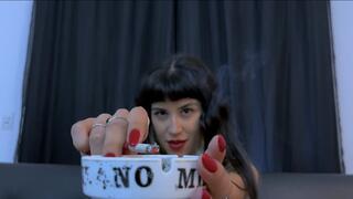 Smoking with red nails