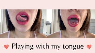 Sexy tongue play with pink lipstick