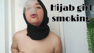 Hijab girl topless smoking and blowing smoke on your face