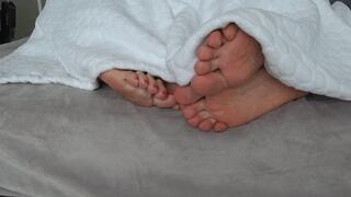 Intertwining toes under the blanket A FS
