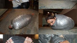 A thick duvet and duct tape mummification cocoon for rara curves (mp4)