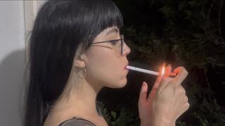 Smoking by the window at night