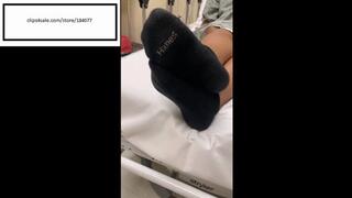 Delicious black hanes socks waiting for doctor