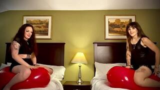 Two hot looners ride and bounce to pop giant balloons