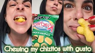 Chewing my cheese puffs with gusto