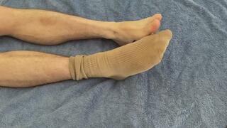 Feet reveal from socks with moisturising and flexing