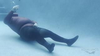 Rubber Man In Nylons Runs Into A Bad Tank Of Air