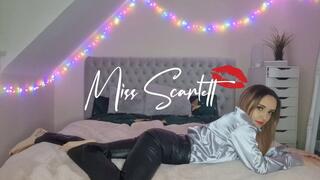 Scarlett's black leather pants & silver satin blouse tease