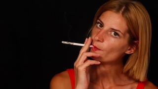 Eve smokes her long 120s with passion and speed, building an impressively thick ash as she takes deep, sensual drags