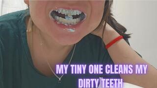 Cleaning my teeth with the help of my tiny